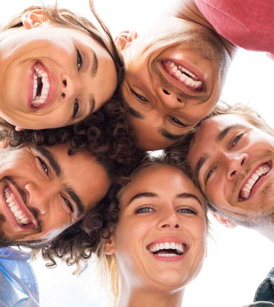 Smiling person showcasing white teeth after laser whitening treatment Dundee